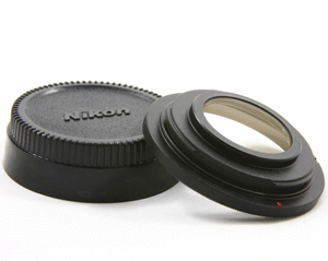 В конструкции переходного кольца есть корректирующая линза